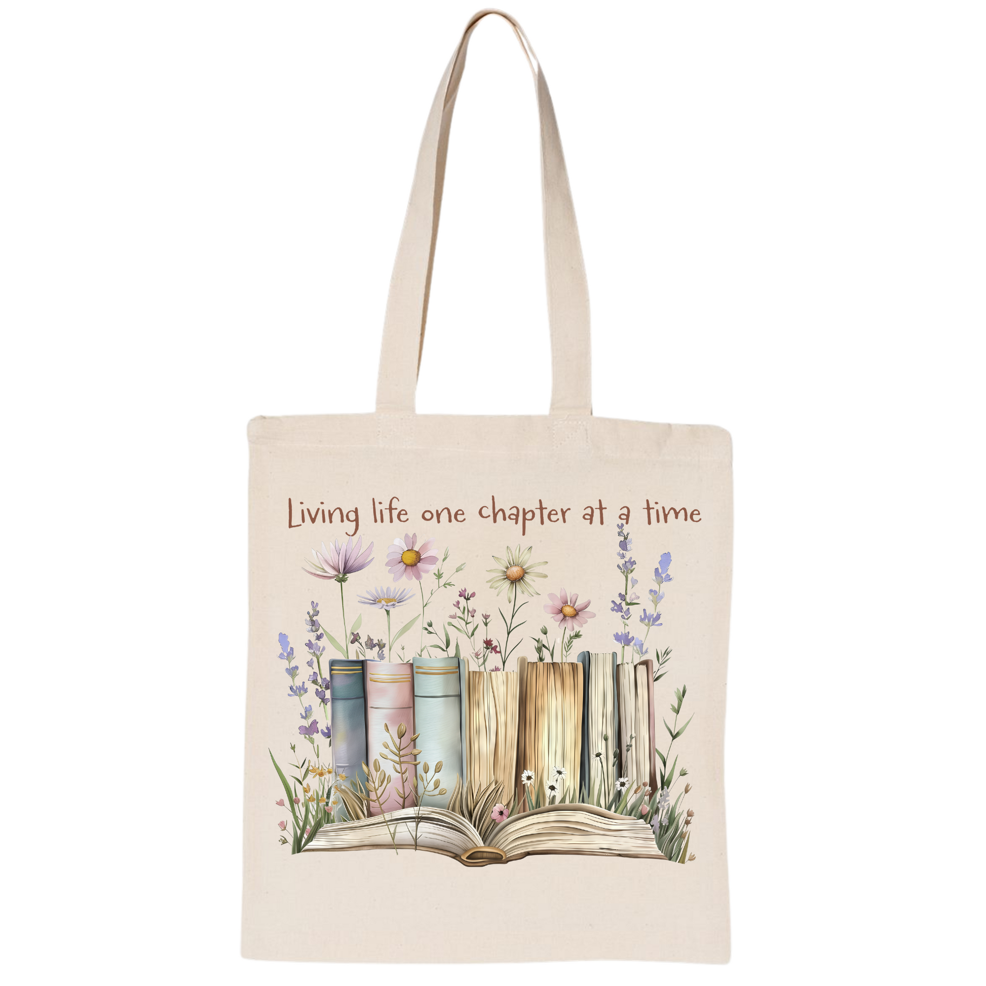 Tote bag with books and flowers design and 'Living life one chapter at a time' text on a white background